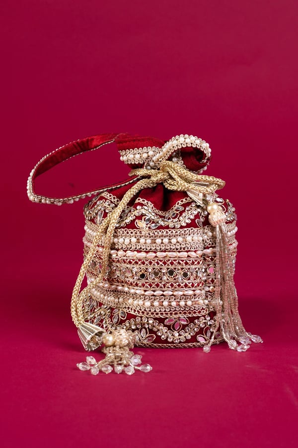 Shiffonz unique crepe pearl potli bag