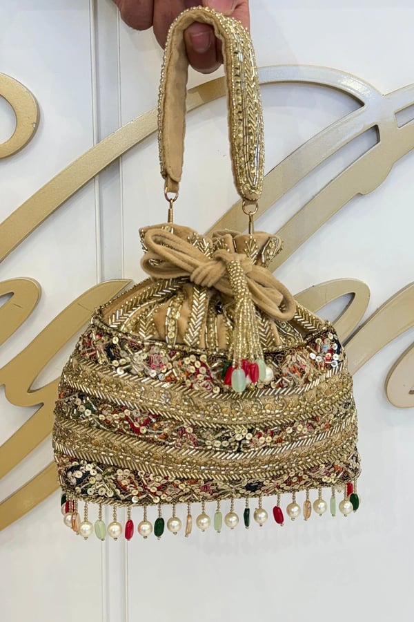 Intricate hand embroidered potli bag