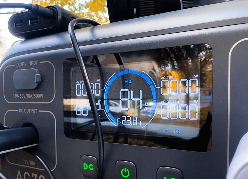 Close up of the digital screen on a power station. Says 84% and 23.8 hours remaining.