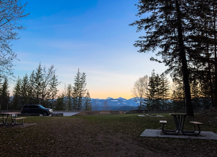 View of the Ione Falls rest stop from the base of the waterfall, looking towards the parking area and lake. Taken just after sunset.