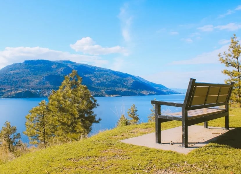 Bench overlooking Okanagan Lake on the Paul's Tomb hiking trail.