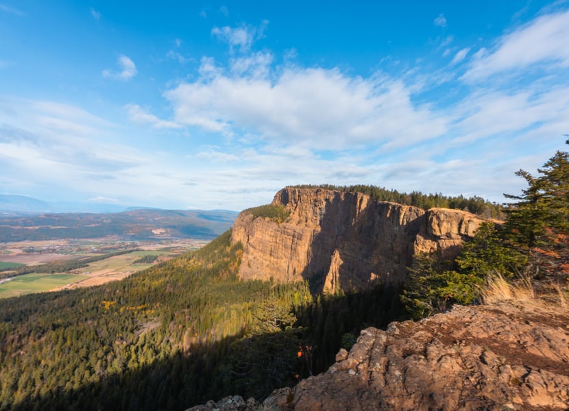 View towards the Enderby Cliffs from a viewpoint. Overlooks the North Okanagan Valley on a sunny, autumn day.