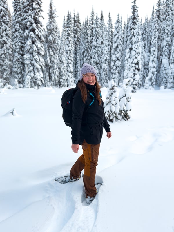 Woman in snowshoes on a wintery day.