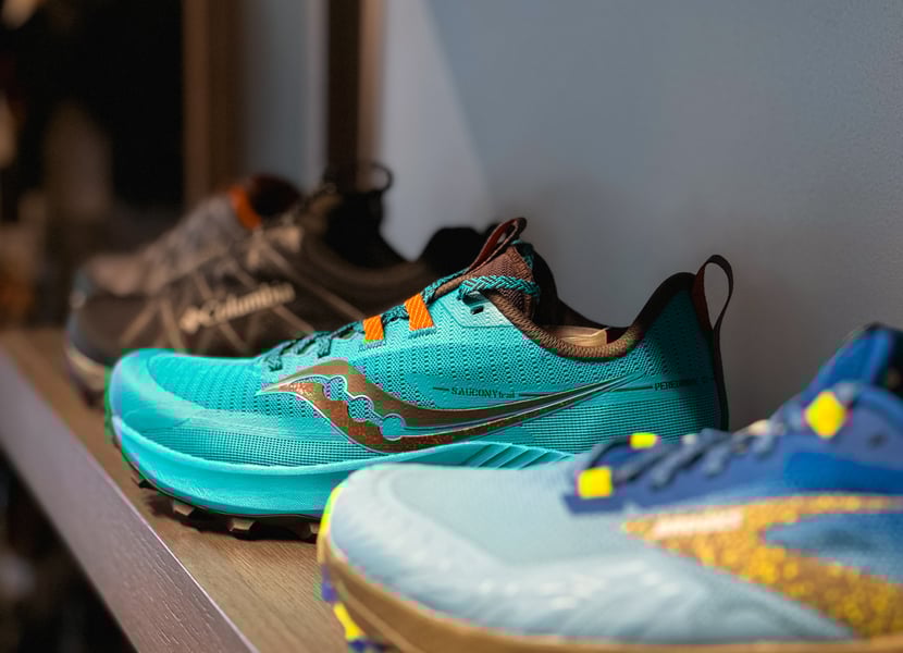 Closeup of trail runners at a Kintec store.