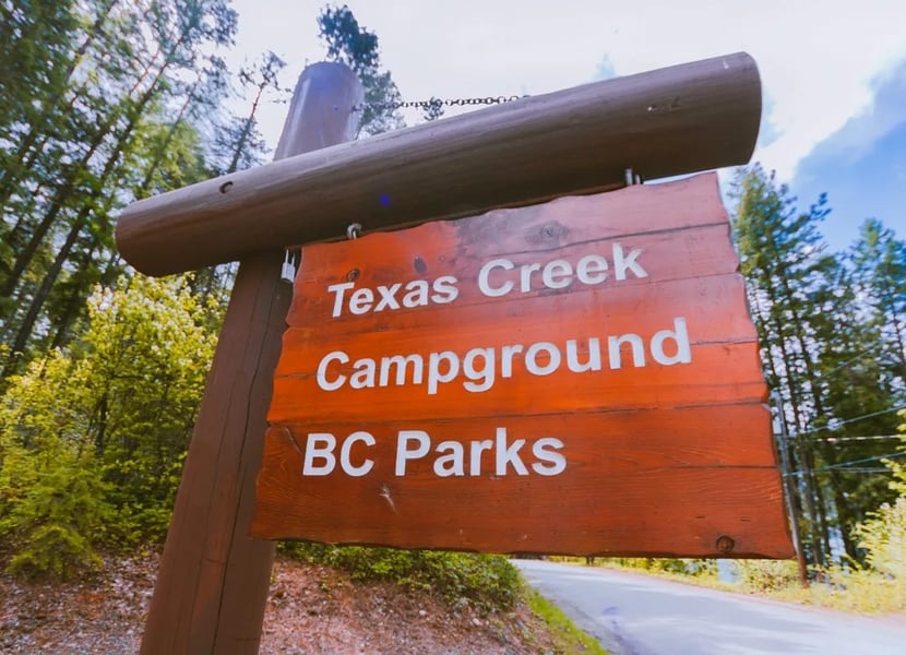 Wooden sign that says "Texas Creek Campground BC Parks"