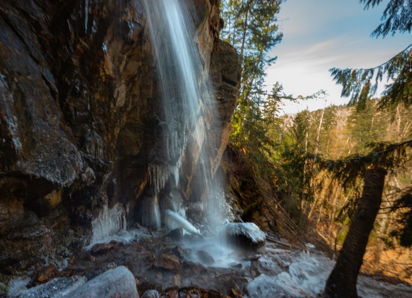 Small waterfall with some ice at the base.