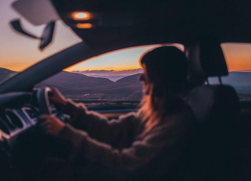 Women driving at night.