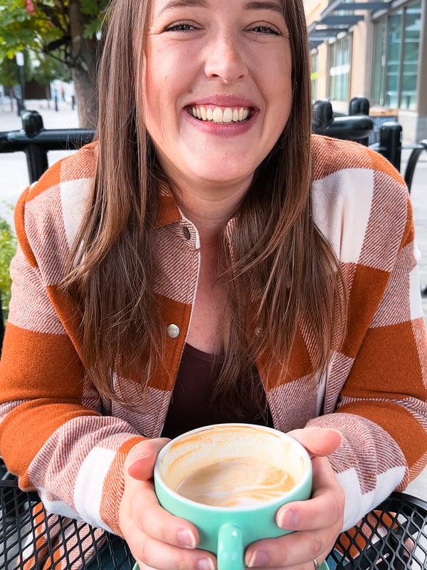 Woman sips a latte