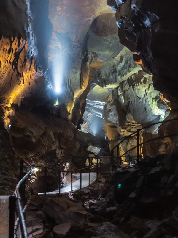 A large underground cave with pathways in Ailwee Cave, a hidden gem.