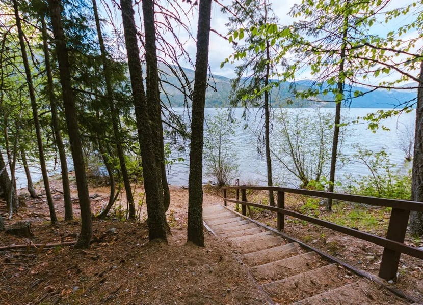 Staircase through the forest leading to Christina Lake