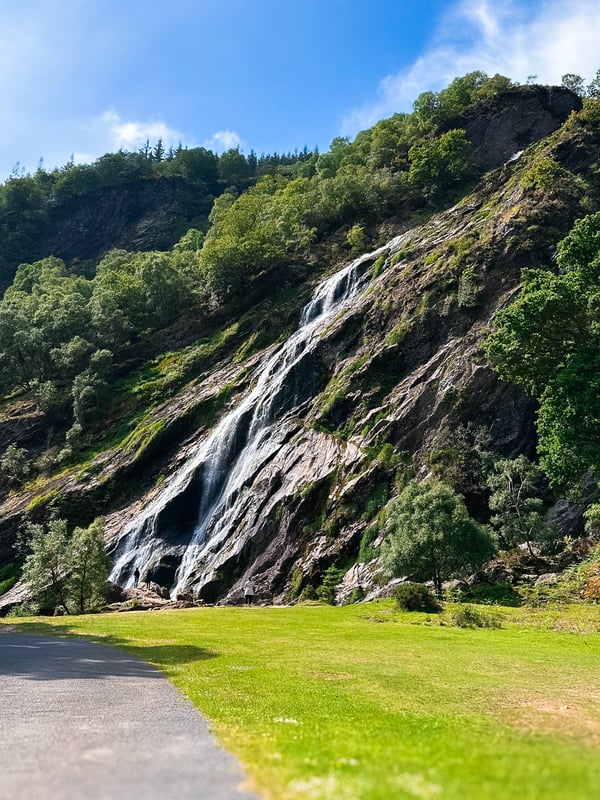 Water cascading down a bedrock face.