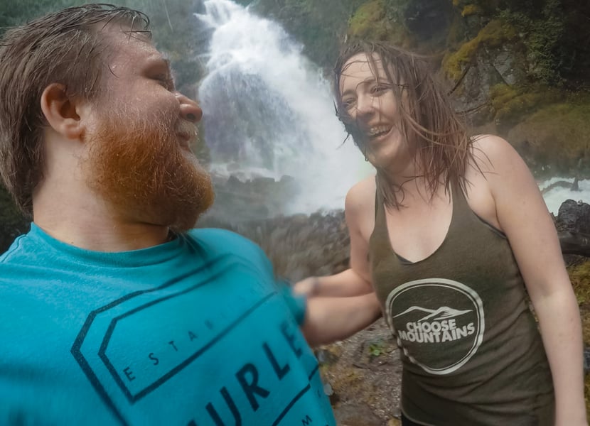 Strong spring flow at Kay Falls creating wind and thick mist at the base