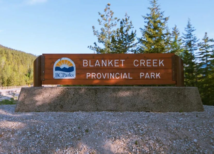 Wooden sign that says Blanket Creek Provincial Park.
