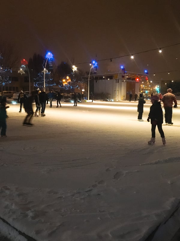 People skating on an outdoor skating rink in downtown Kelowna