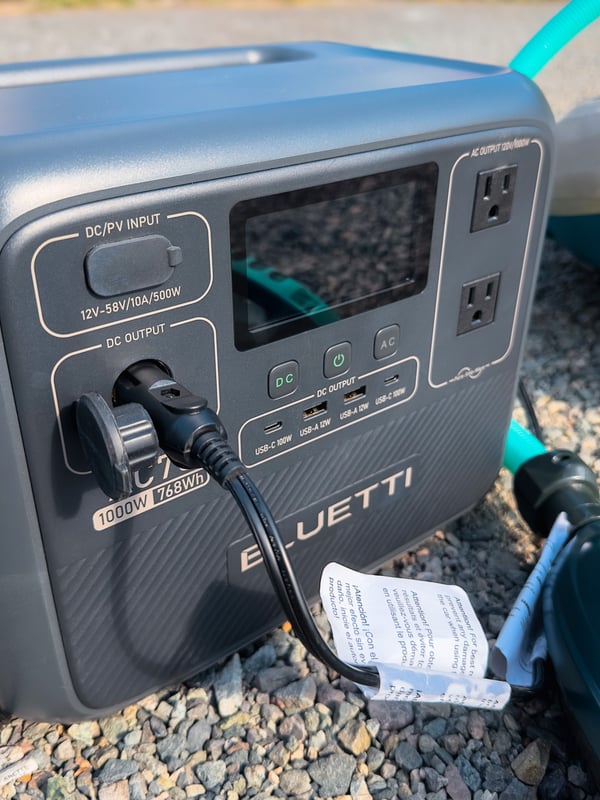 Portable pump plugged into the power station.