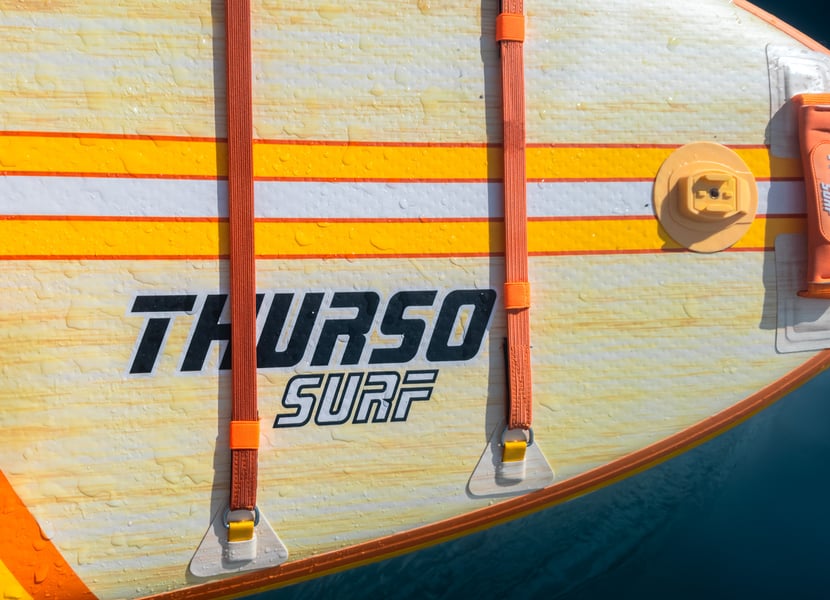 Closeup of the front of a Thurso Surf paddleboard