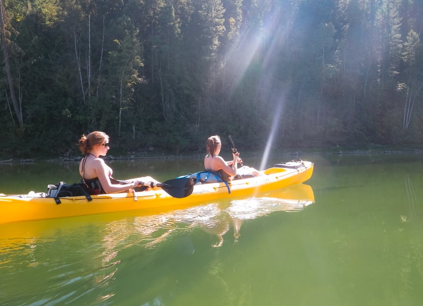 Two women kayaking on the Enderby River.