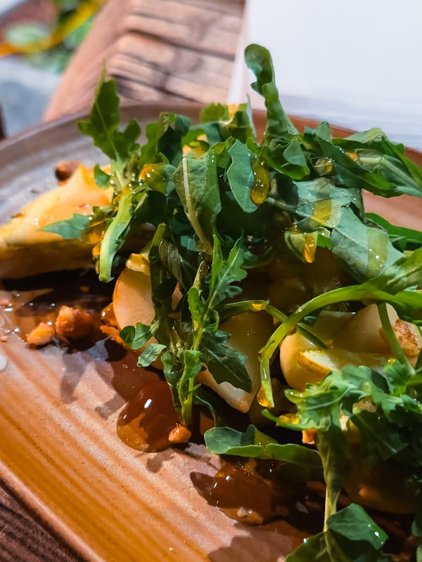 Close up of food with pears and arugula 