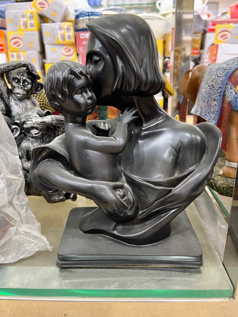 Black Statue of a Woman Holding a Baby | Sculpture | Bronze | Black