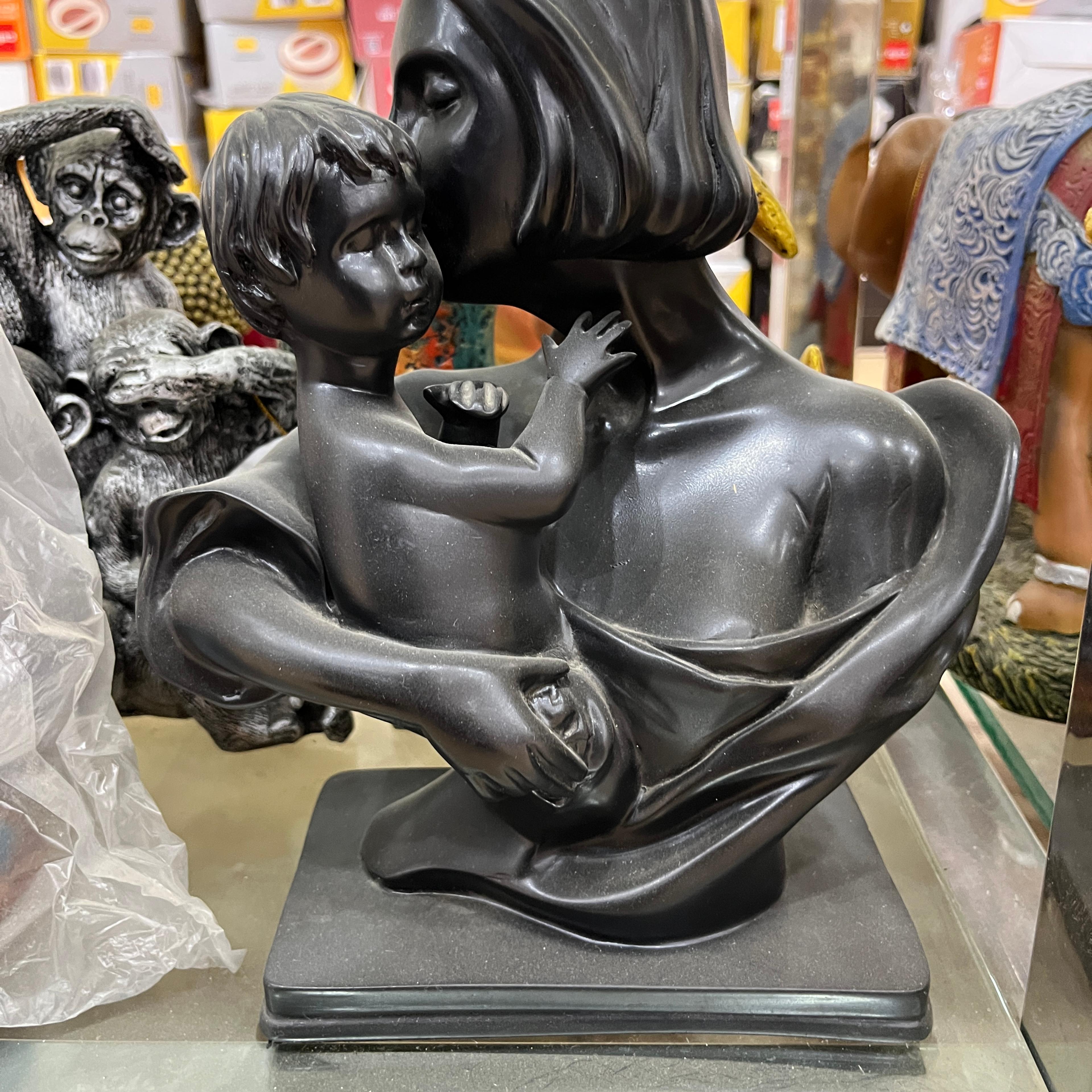 Black Statue of a Woman Holding a Baby | Sculpture | Bronze | Black