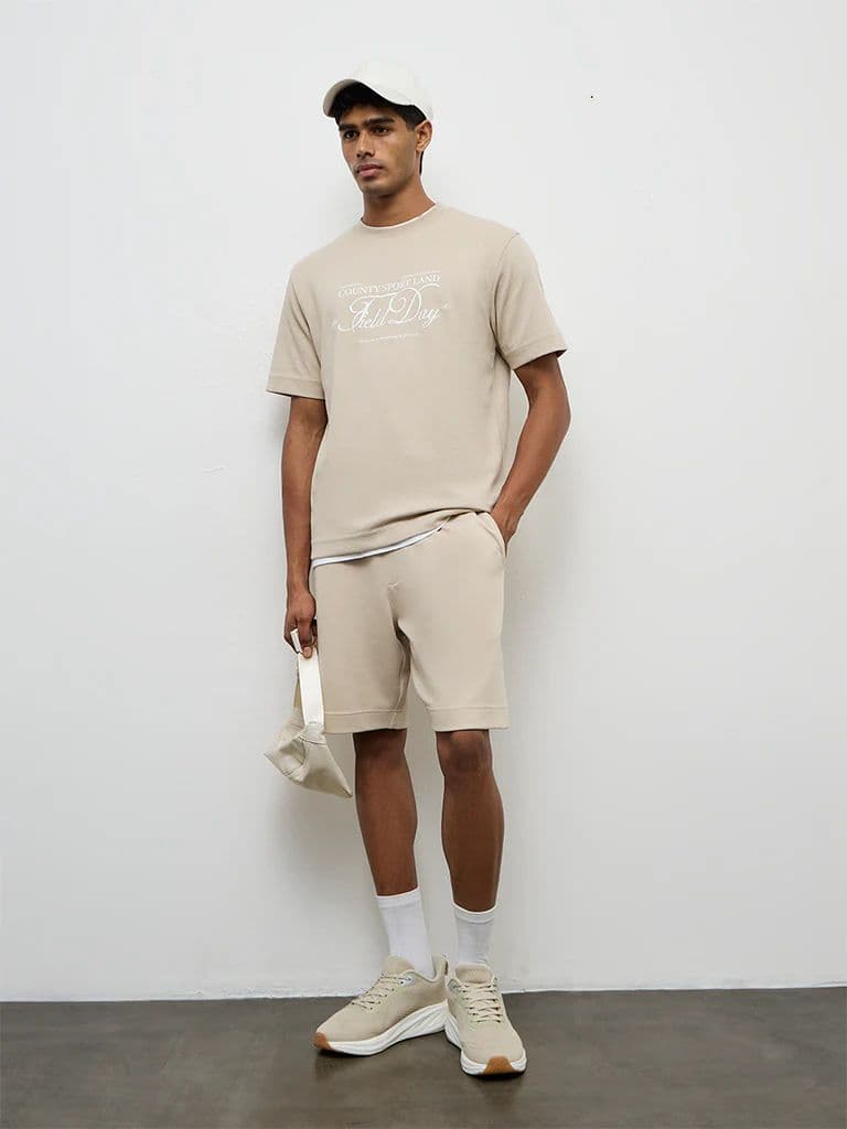 Nuoflexx Beige Text Printed Relaxed-Fit Cotton-Blend T-Shirt