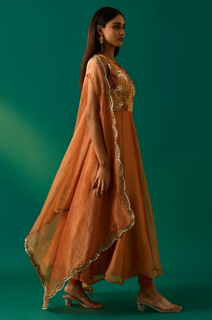 Orange Embroidered Flared Net Dress with Churidar and Cape Set — photo 4