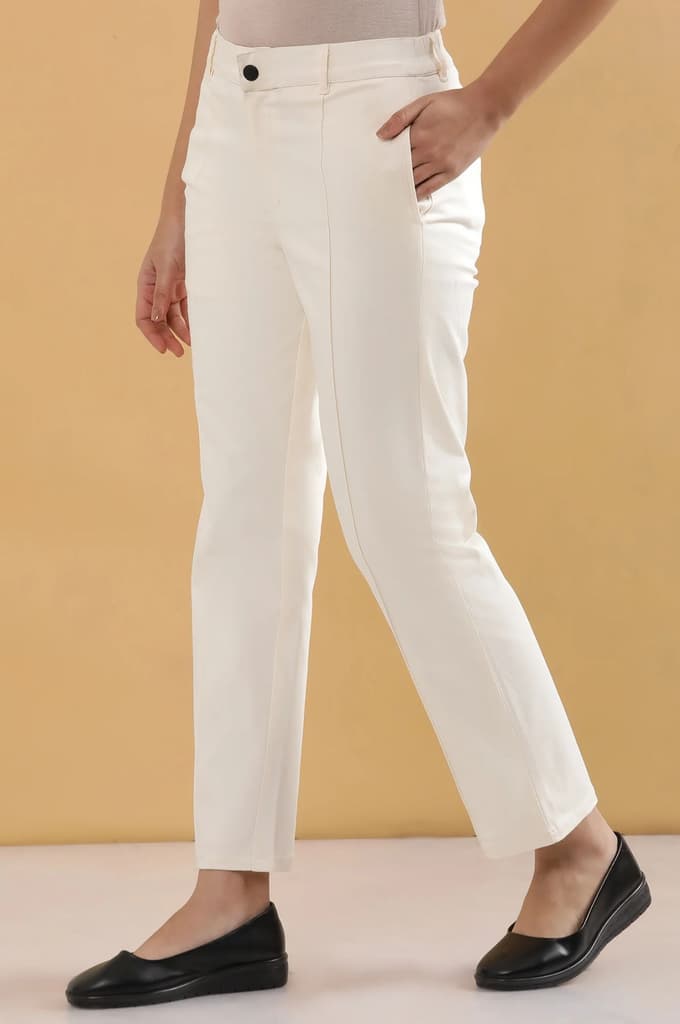 Off White Solid Straight Fit Cotton Pants With Pintuck Detail — photo 3