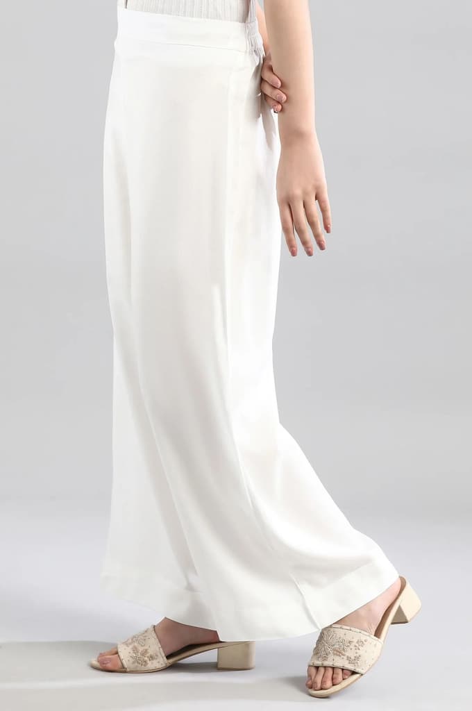 White Solid Flared Woven Palazzo With Elasticated Waistband — photo 3