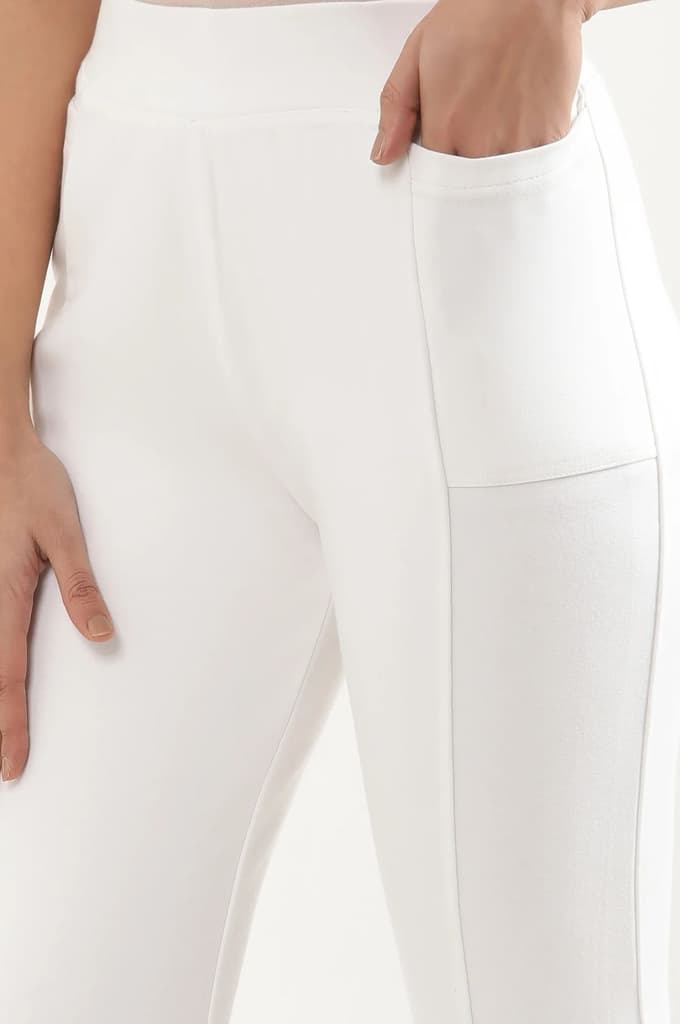 Off White Solid Boot Cut Pants With Elasticated Waist — photo 7