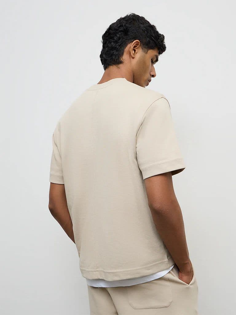 Nuoflexx Beige Text Printed Relaxed-Fit Cotton-Blend T-Shirt — photo 4