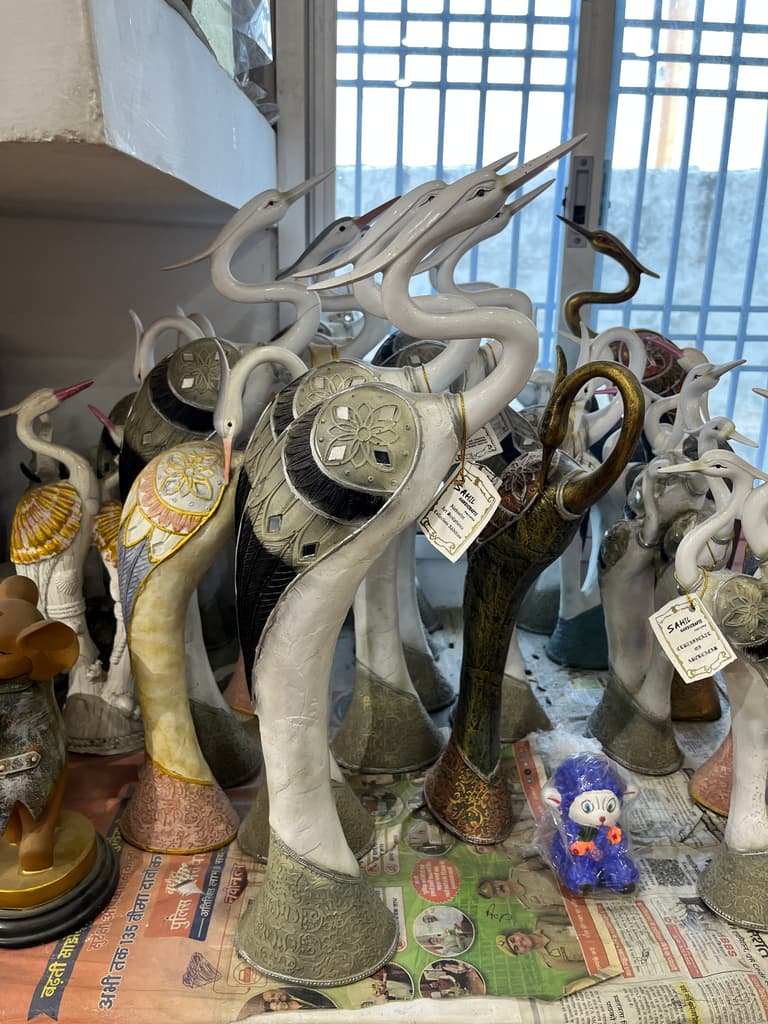 A collection of various animal statues, including a | Unknown | Unknown