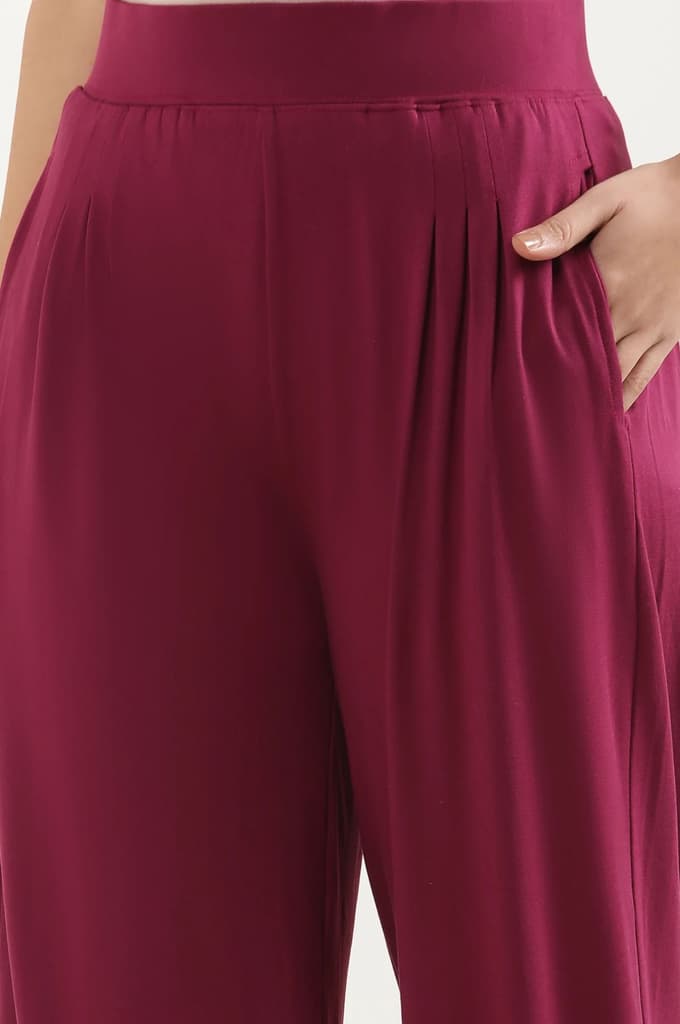 Purple Solid Loose Fit Pants With Pleated Detail — photo 8