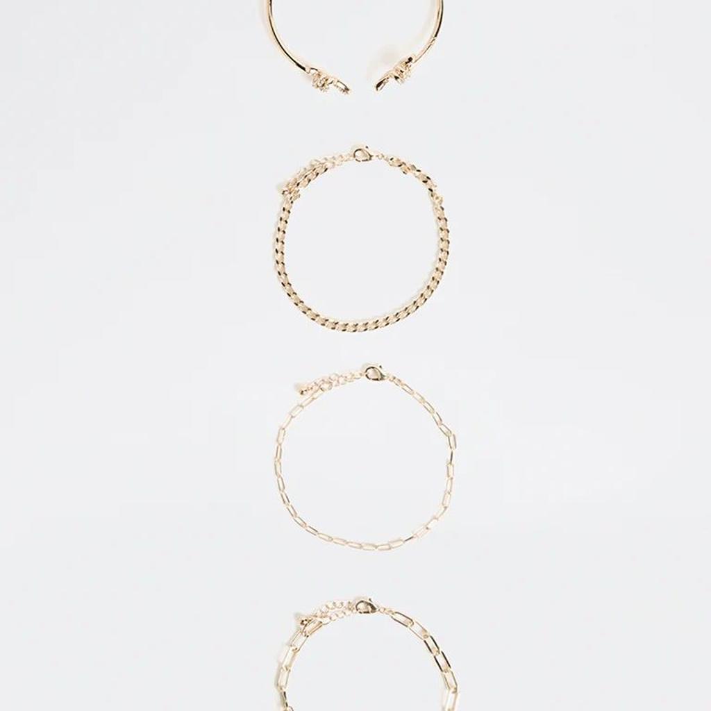 Westside Accessories Gold Knot Stack Bracelets - Pack of 4