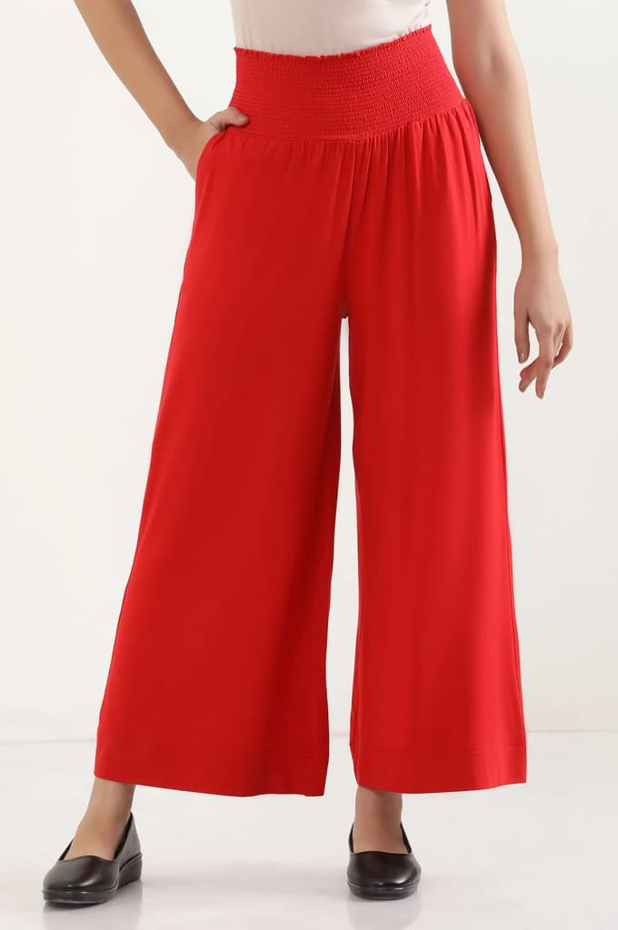 Red Solid Flared Pants With Smocked Waistbelt — photo 2