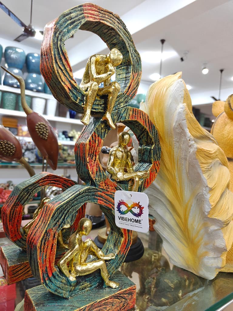 Gold Statue of Two People Sitting | Sculpture | Bronze | Gold