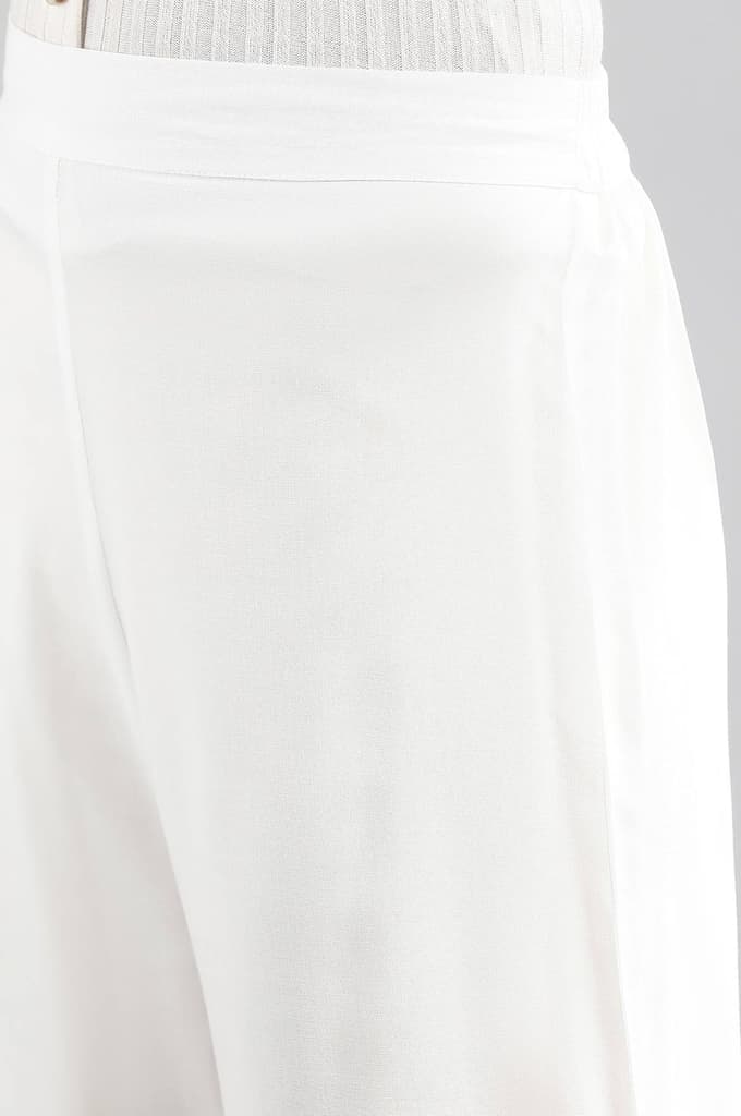 White Solid Flared Woven Palazzo With Elasticated Waistband — photo 6