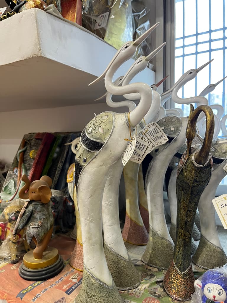 A collection of various animal statues, including a | Unknown | Unknown