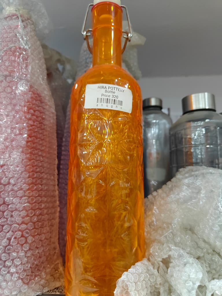 Herra Potette | Oil | Clear | Orange