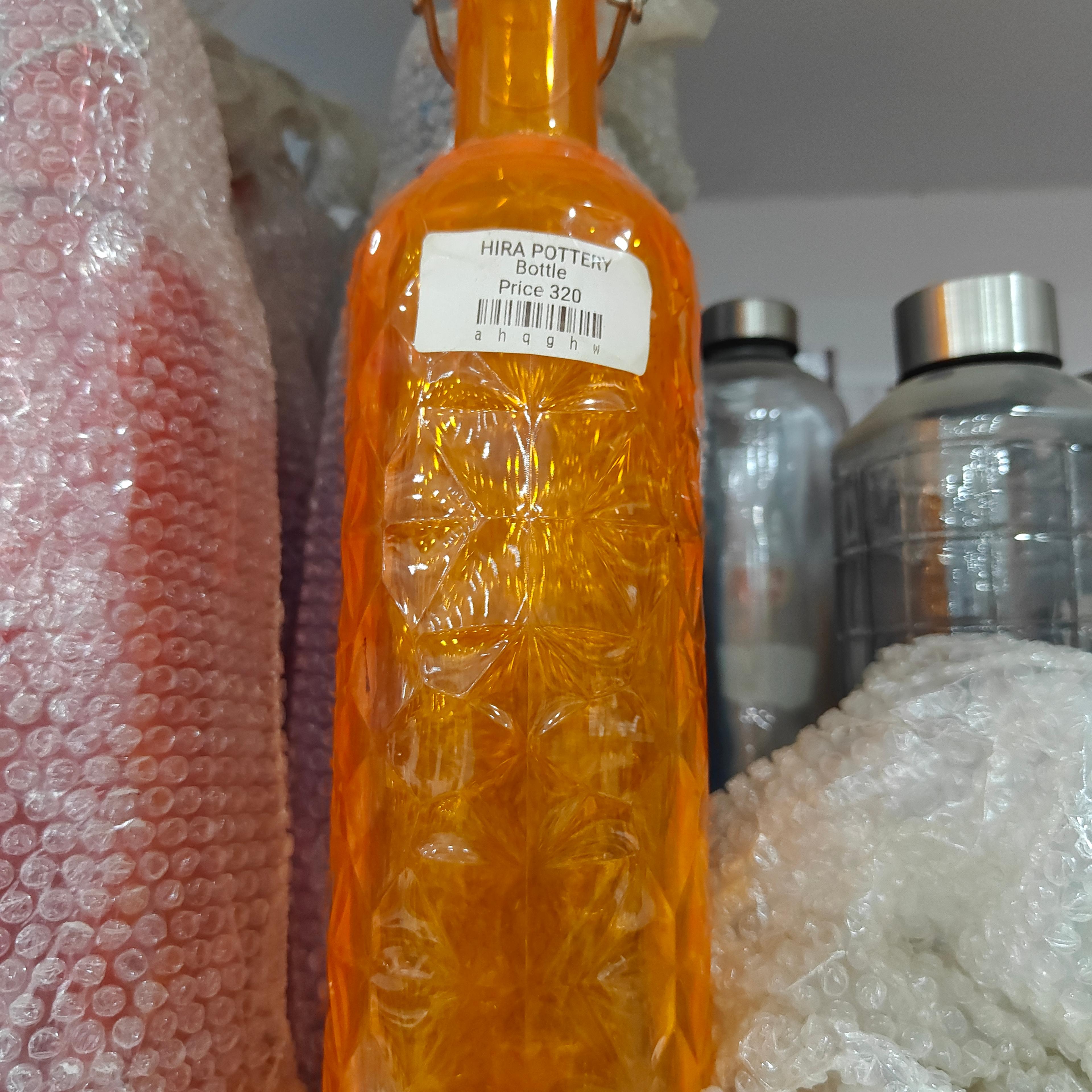 Herra Potette | Oil | Clear | Orange