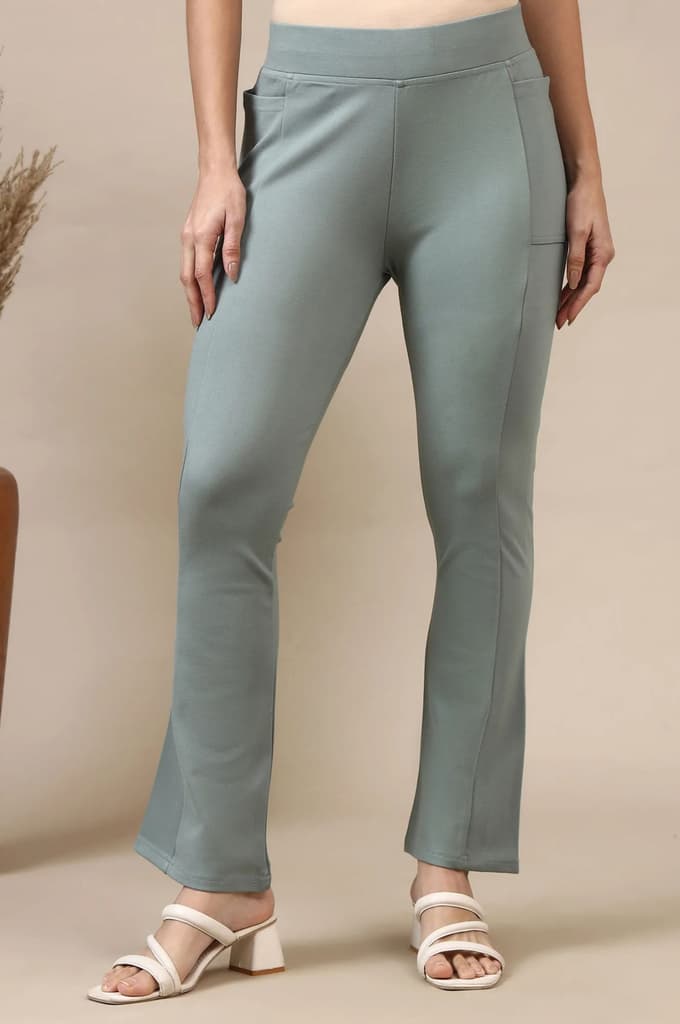 Green Solid Flared High Waisted Yoga Tights With Side Pockets — photo 2