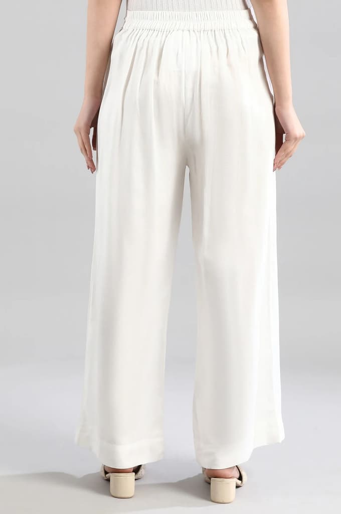 White Solid Flared Woven Palazzo With Elasticated Waistband — photo 2