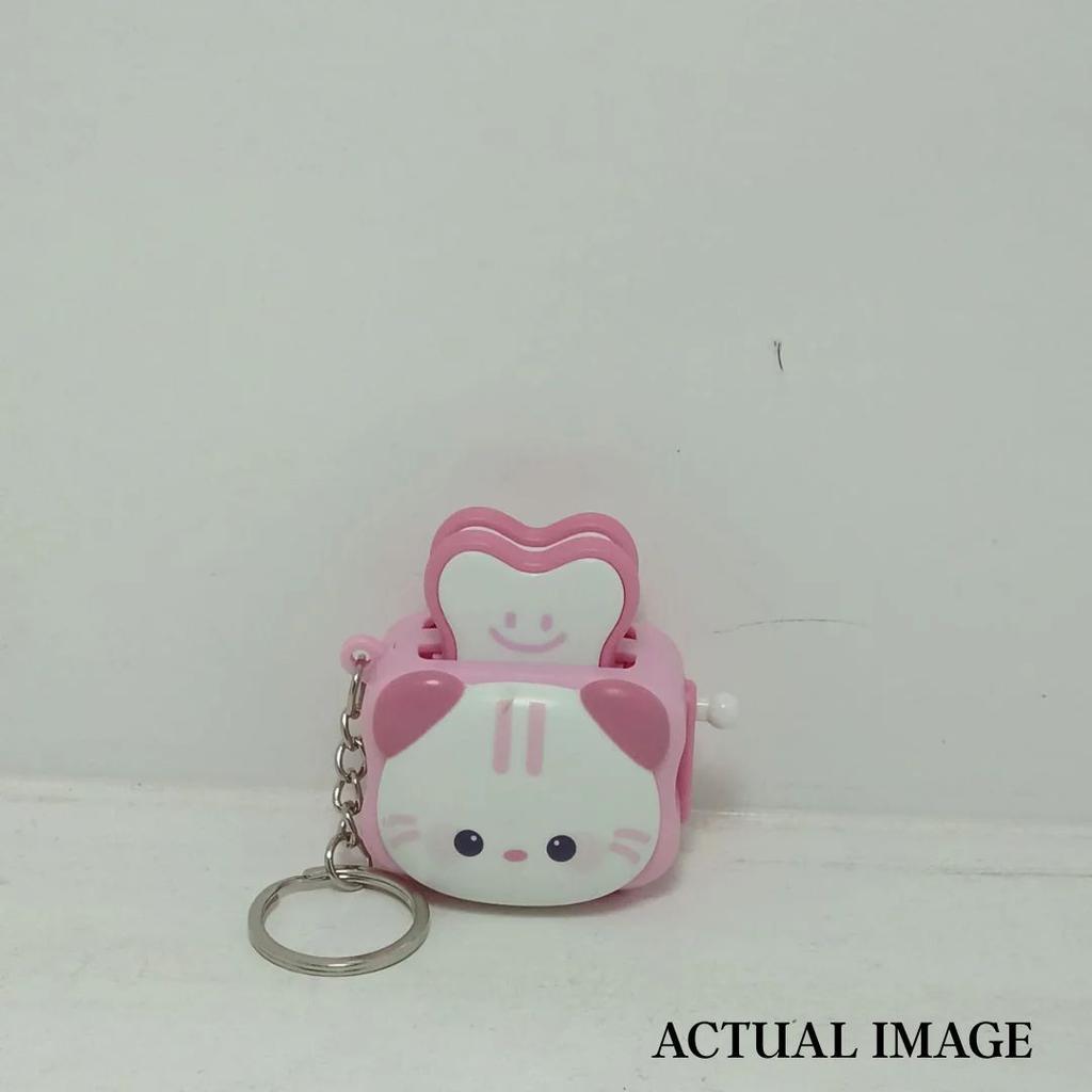 Cute Popping Toaster Keychain Toy — photo 7
