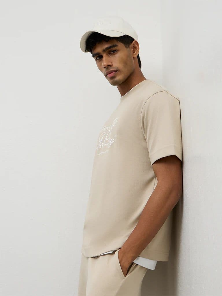Nuoflexx Beige Text Printed Relaxed-Fit Cotton-Blend T-Shirt — photo 2