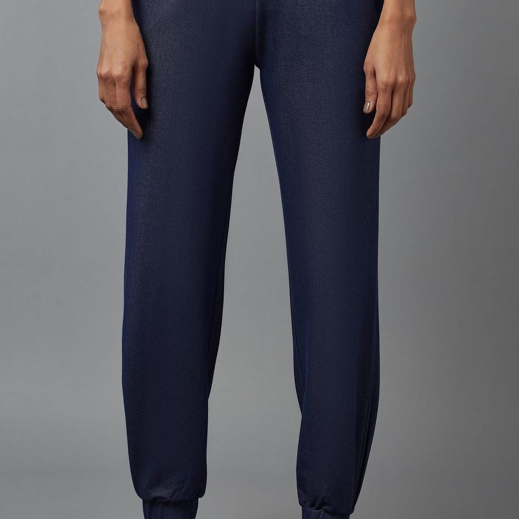 Navy Blue Solid Tapered Cotton Pants With Pleated Detail
