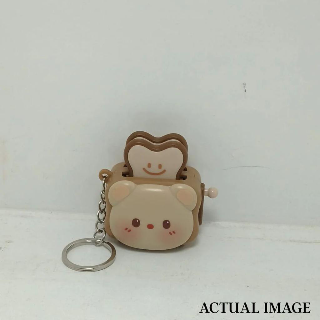 Cute Popping Toaster Keychain Toy — photo 8