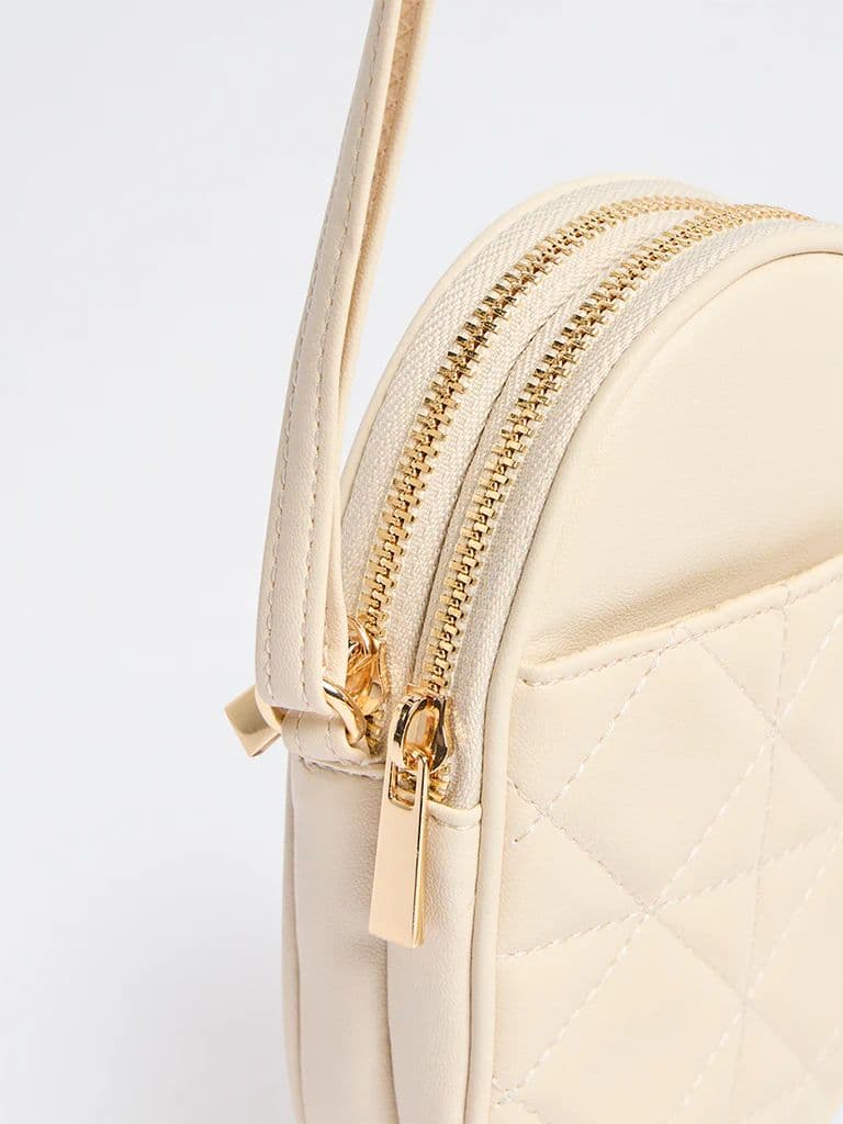 Westside Ivory Quilted Phone Sling Bag — photo 2