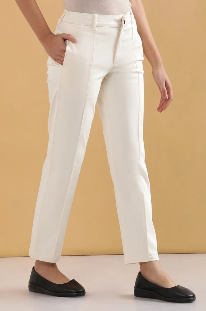 Off White Solid Straight Fit Cotton Pants With Pintuck Detail — photo 5