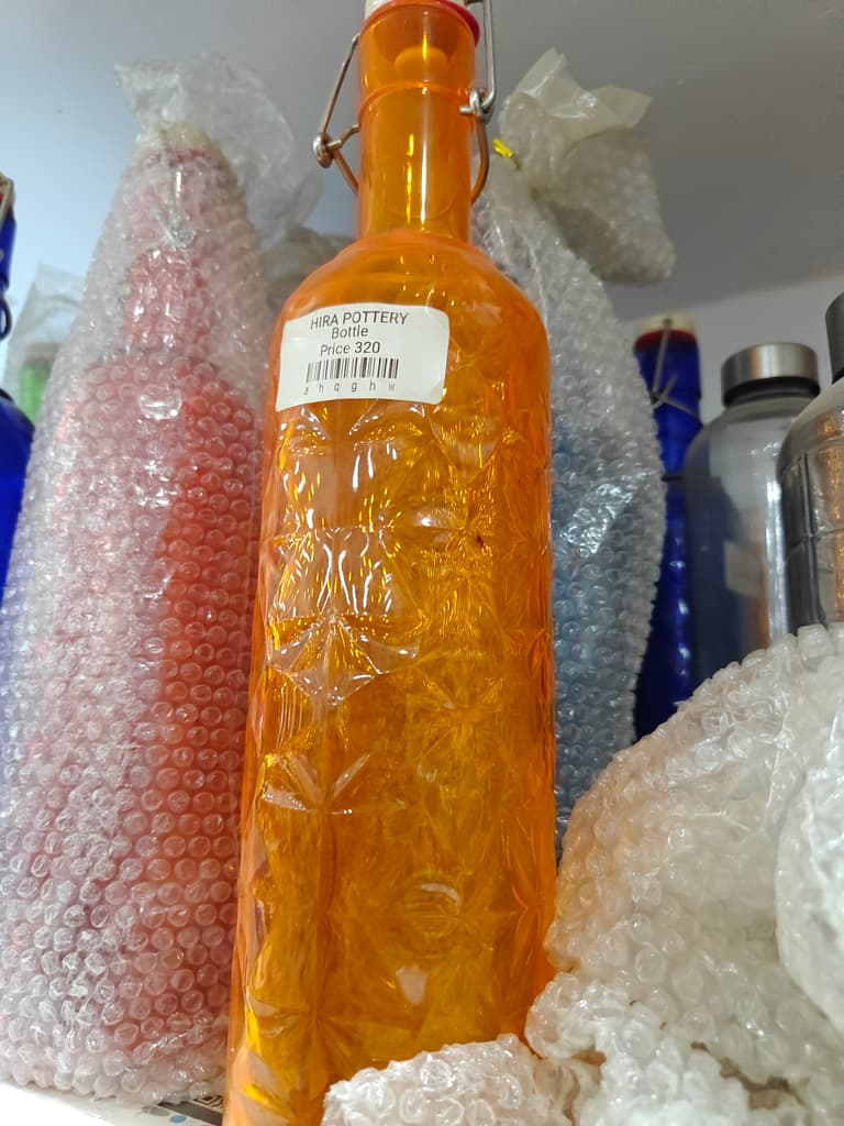 Herra Potette | Oil | Clear | Orange