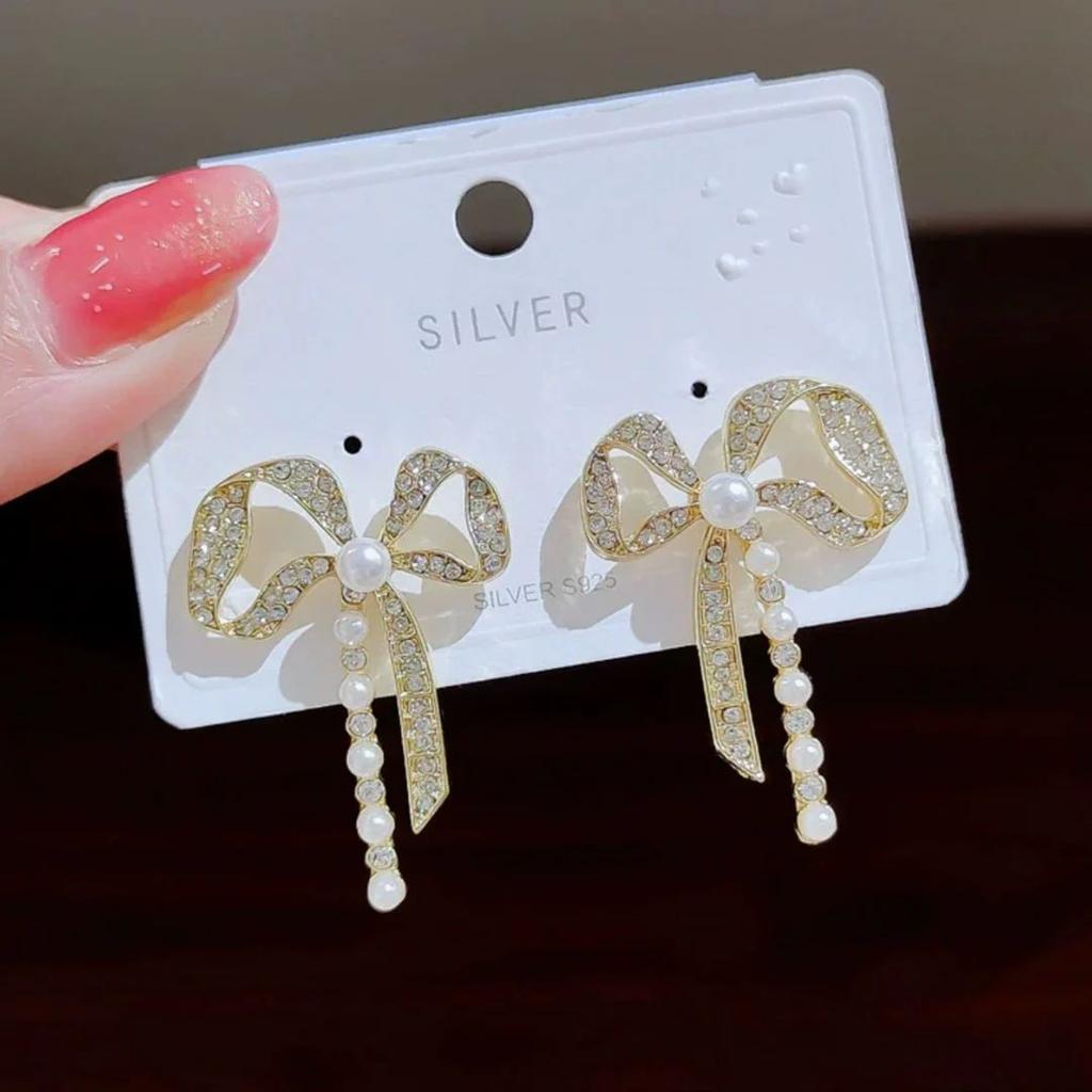 Bow Shaped Earrings | Elegant and Timeless Jewelry — photo 11