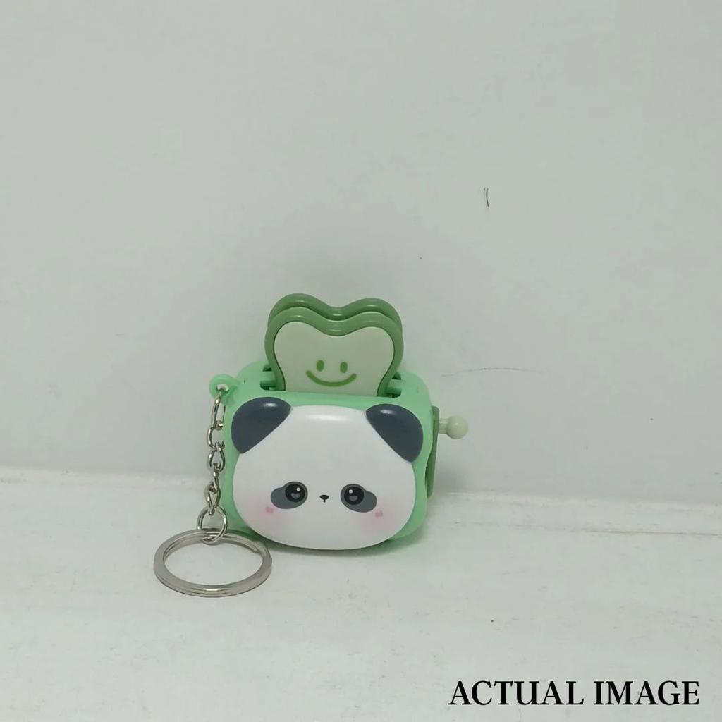 Cute Popping Toaster Keychain Toy — photo 9